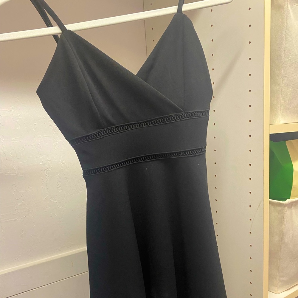 Sorry the photo is cropped dress is longer then this! So cute and barely worn!